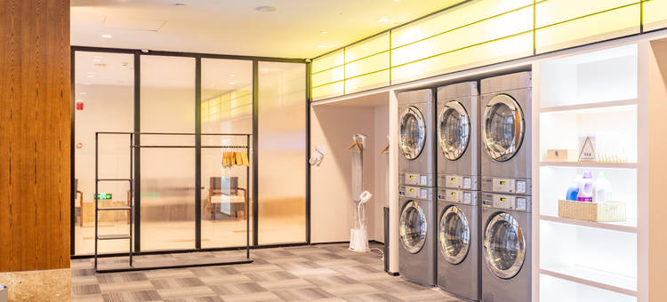 Wanda Jin Suites laundry room